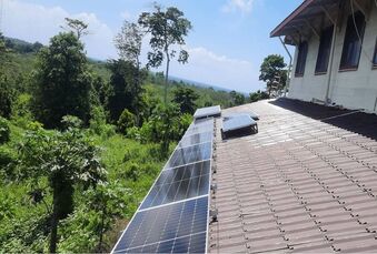 What is the composition of the portable solar power system